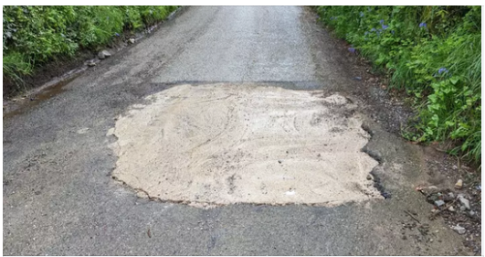Motorist Takes Matters into Their Own Hands and Fills Giant Pothole in Cornwall
