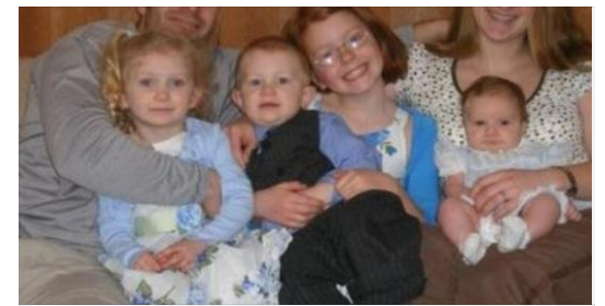 Can you yet see the horrible truth hidden in this family photo?