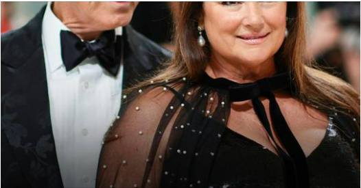 Pierce Brosnan’s ‘Ageless’ Wife Draws Attention Flaunting Her Curves in Figure-Hugging Pink Dress