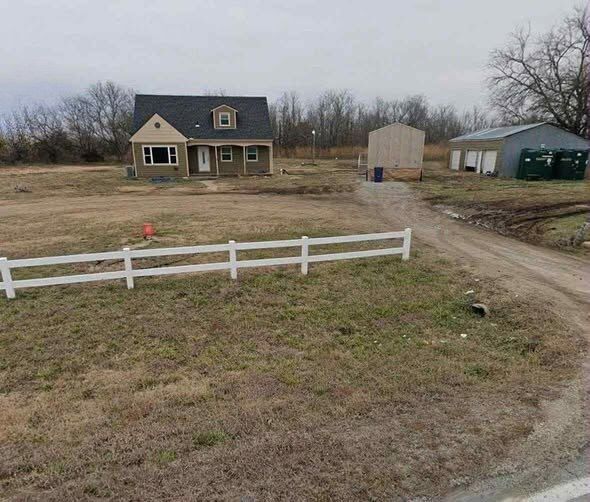 “Incredible Real Estate Opportunity: Spacious 4-Bedroom Home in the Heart of Augusta, Kansas, Featuring Expansive Acreage, a Detached Garage, and Generous Outdoor Space Perfect for Gardening, Recreation, or Hobby Projects. This Charming Property Blends Comfort, Privacy, and Limitless Potential, Offering a Rare and Unmatched Chance to Own a Versatile Family Retreat.”