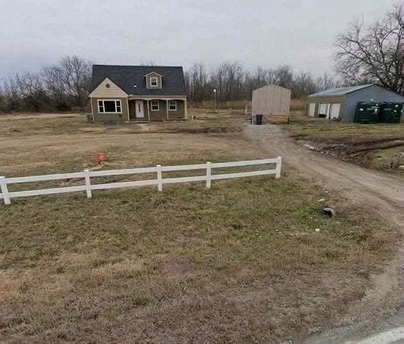 “Incredible Real Estate Opportunity: Spacious 4-Bedroom Home in the Heart of Augusta, Kansas, Featuring Expansive Acreage, a Detached Garage, and Generous Outdoor Space Perfect for Gardening, Recreation, or Hobby Projects. This Charming Property Blends Comfort, Privacy, and Limitless Potential, Offering a Rare and Unmatched Chance to Own a Versatile Family Retreat.”