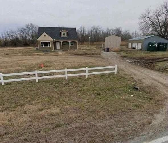 “Incredible Real Estate Opportunity: Spacious 4-Bedroom Home in the Heart of Augusta, Kansas, Featuring Expansive Acreage, a Detached Garage, and Generous Outdoor Space Perfect for Gardening, Recreation, or Hobby Projects. This Charming Property Blends Comfort, Privacy, and Limitless Potential, Offering a Rare and Unmatched Chance to Own a Versatile Family Retreat.”